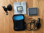 Garmin Nuvi 1200 Gps Navigation System With Clip & Dash Mount Bundle. Fixed Price $18.00.