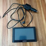 Garmin Nuvi 55LM 5" Portable Gps Unit With Car Charger Bundle. Fixed Price $28.49.