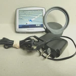 Tomtom One N14644 Gps With Mount Suction Usb Charging Cable Wall Charger Bundle. Fixed Price $16.70.