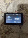 Garmin Nuvi 145-01615-10 Gps Navigation Bundle 5" Screen With Charger And Mount. Fixed Price $40.00.