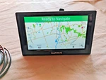 Working Garmin 145-01615-12 Gps Driving Direction Navigation & Charger/mount. Fixed Price $22.00.